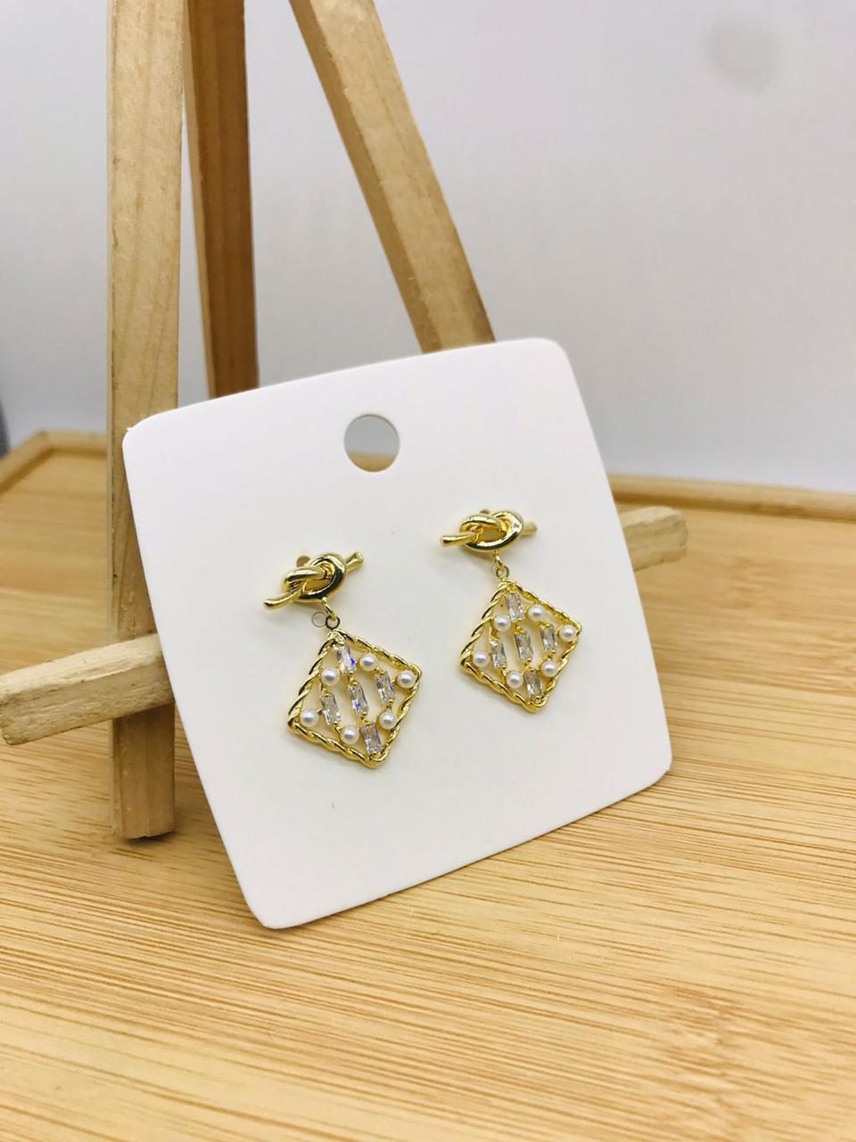 2 AD Diamond Steel And Rose Gold Party Wear Earrings Manufacturers

